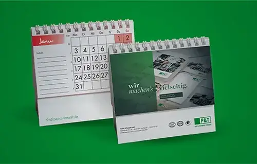 Zwei Kalendermotive vor einem grünen Hintergrund.